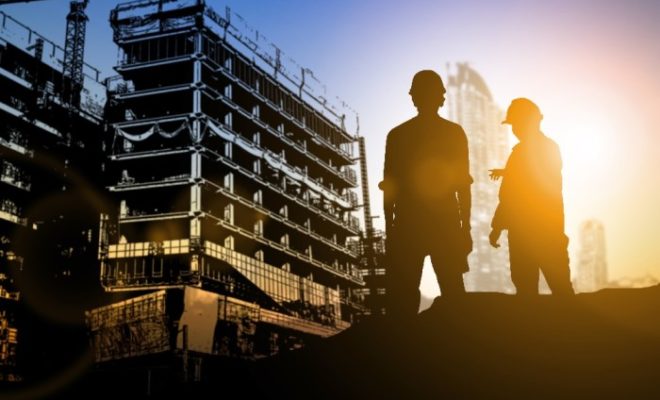 stock-photo-silhouette-businessman-engineer-looking-blueprint-in-a-building-site-over-blurred-construction-site-517922980 stock-photo-silhouette-businessman-engineer-looking-blueprint-in-a-building-site-over-blurred-construction-site-517922980